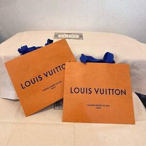 Louis Vuitton Orange Bag with Blue Handles